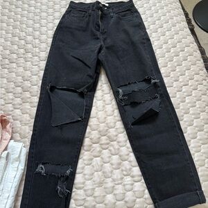 Vibrant Black Straight Leg Jeans with Distressed Details